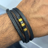 دستبند چرمی قفل و پلاک استیل مردانه کارتیر Cartier کیفیت چرم عالی تنوع طرح رنگ ثابت کدbn (پس کرایه)