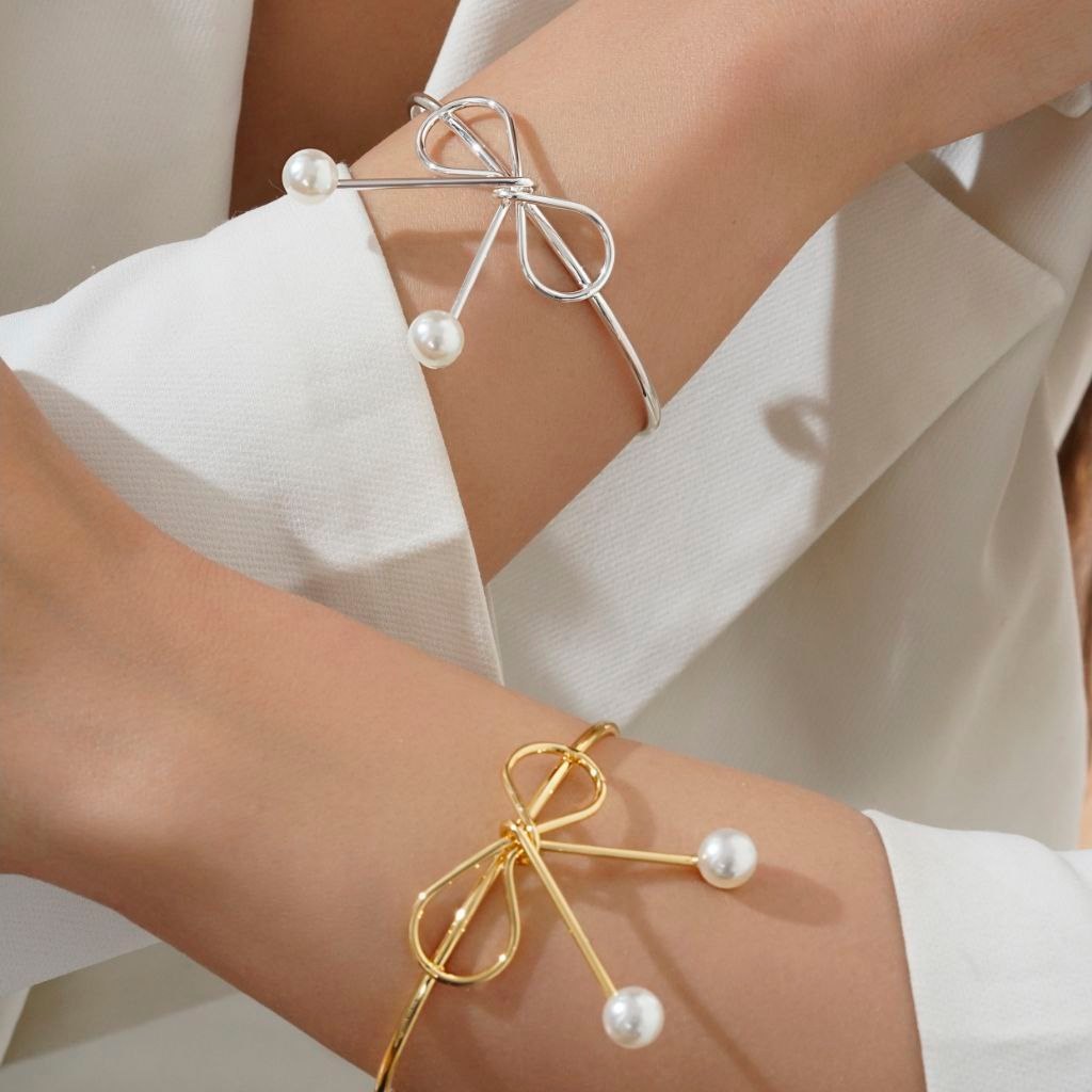 دستبند بنگل النگویی فنری طرح پیچ پهن رنگ ثابت تنوع طرح کد mp