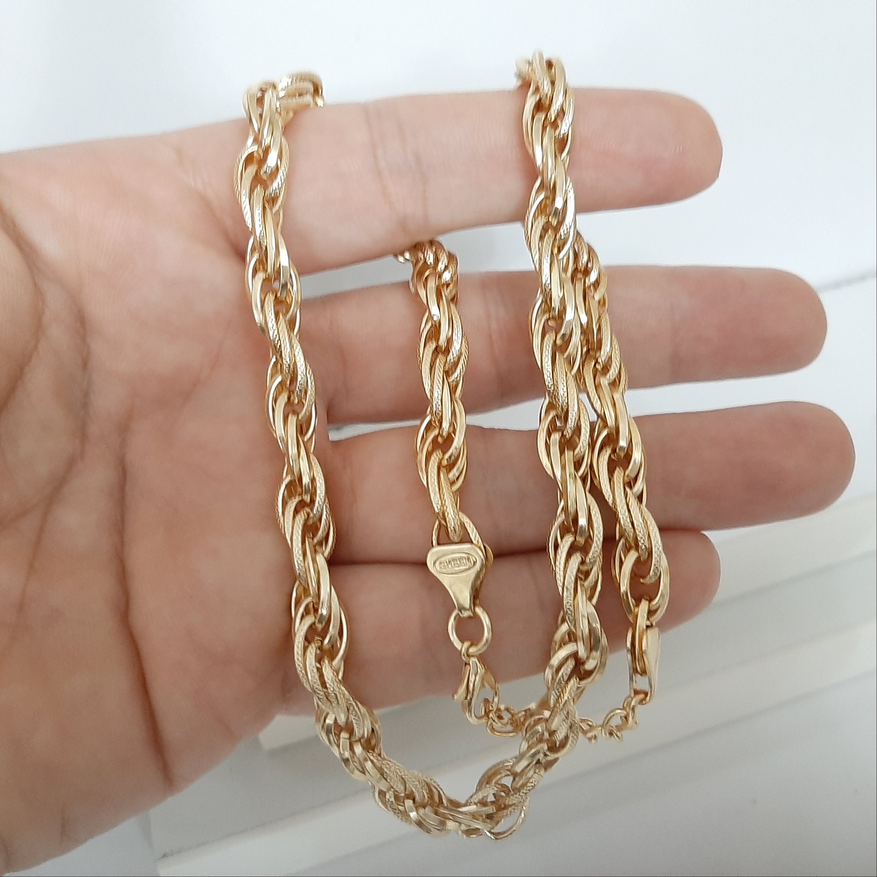 گردنبند زنجیری رنگ ثابت با طلا مونمیزنه ورق بزنید لطفا